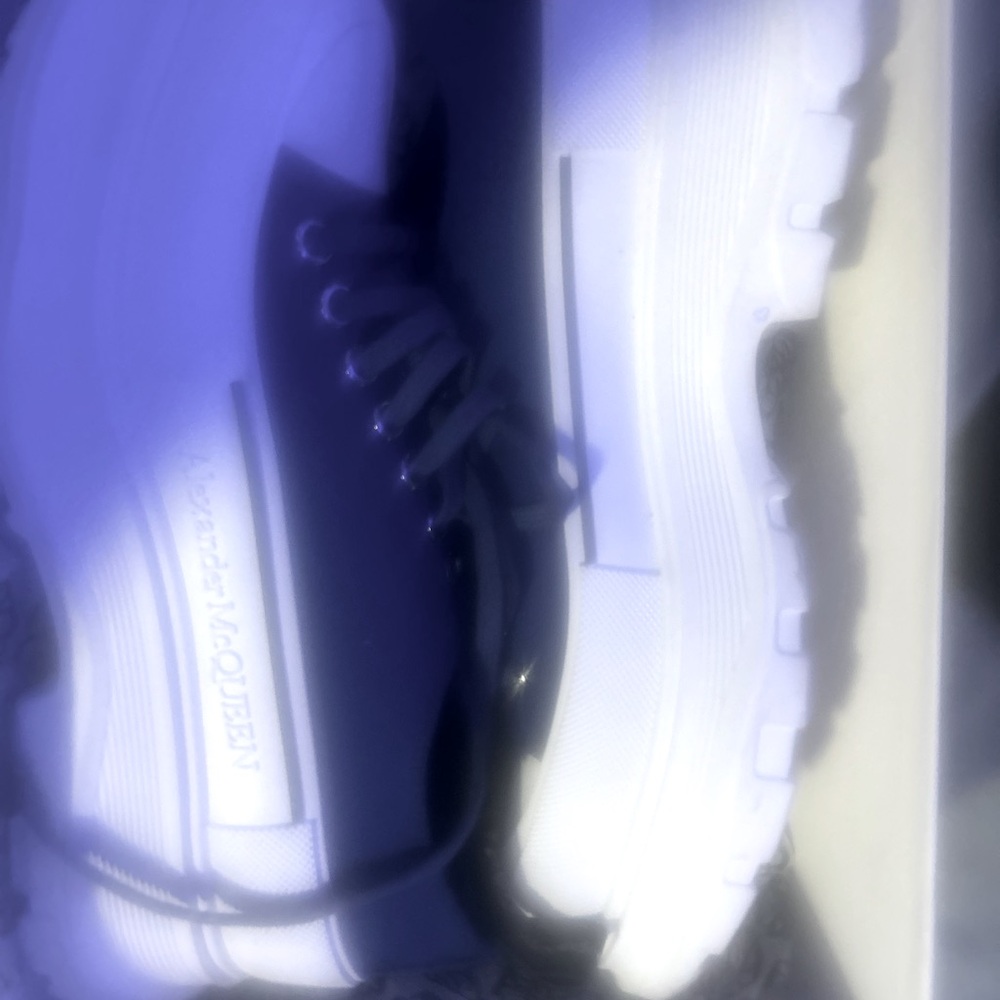 Blue and white platform sneakers with a chunky sole. Comes with original box.
